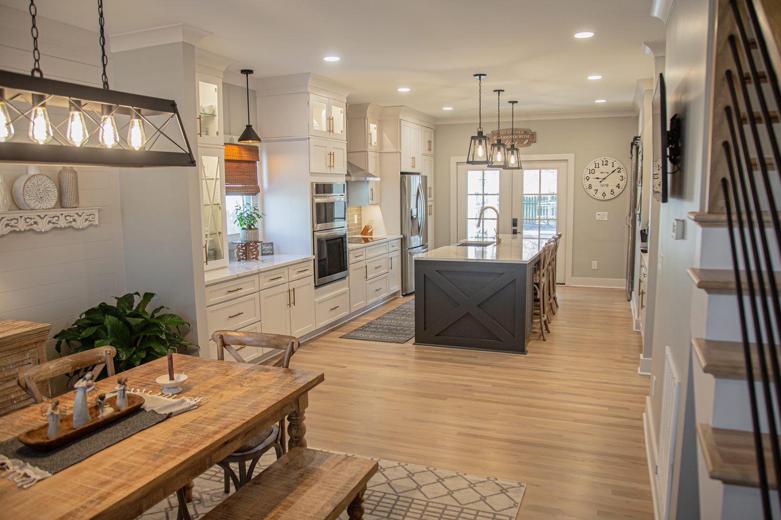 Renovated open-concept kitchen with island seating